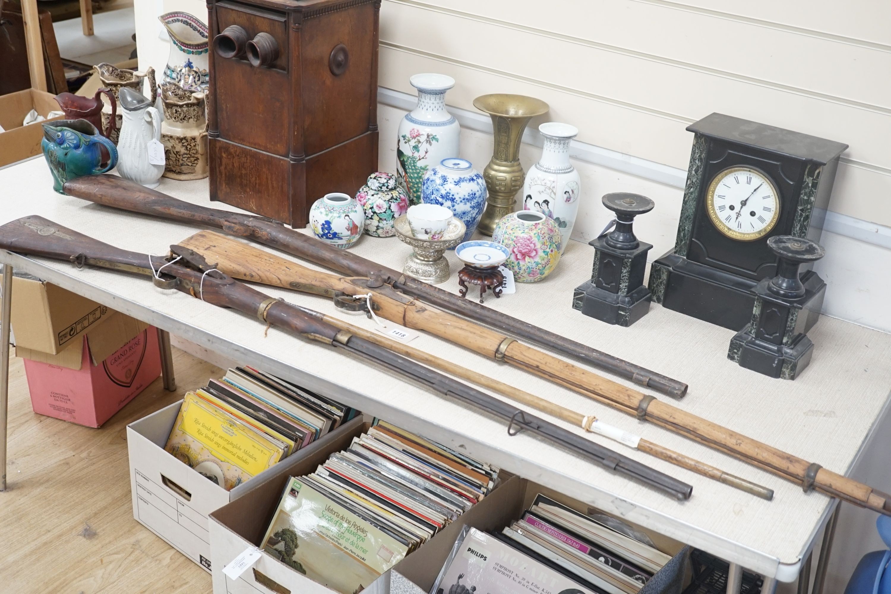 Three 19th century percussion rifles, (each in need of restoration), and a Belgian ramrod, longest 134 cms.